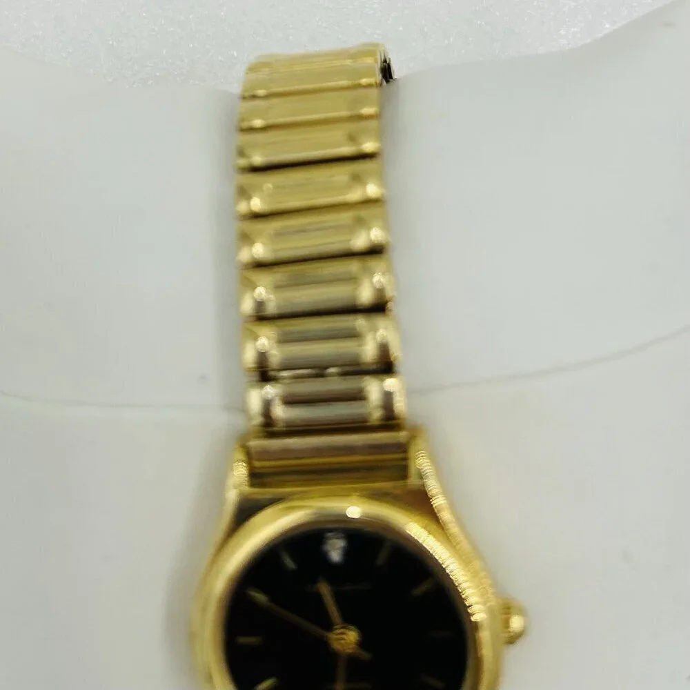 Milan Diamond Quartz Vintage Ladies Watch Gold Stretch Band Black Face